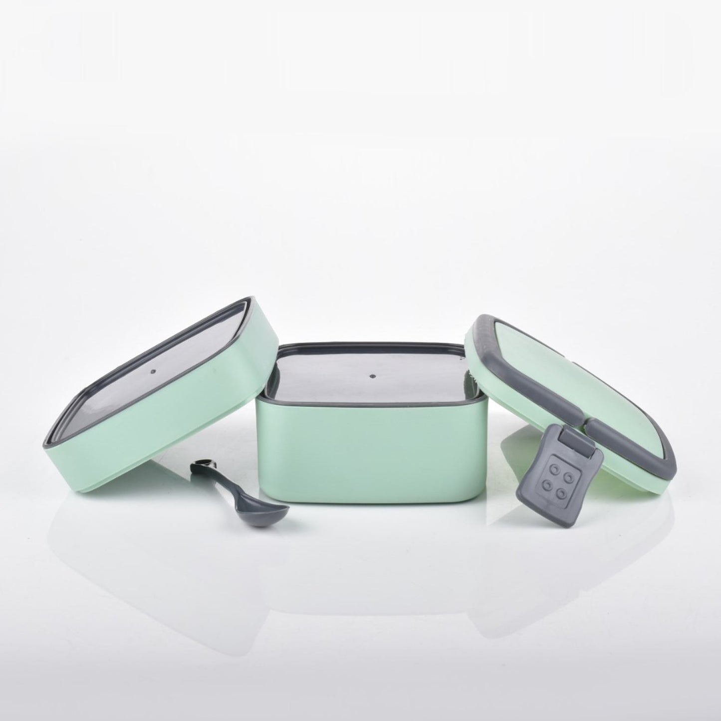 green lunch box with spoon 